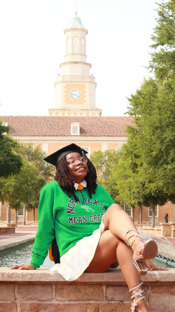 Egenti in a graduation photo